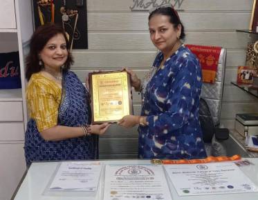 Riddhe Sshilpi Receiving Certificates